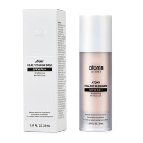 GASHINA STORY Atomy Healthy Glow Base next to a coin for size comparison and travel-ready convenience
