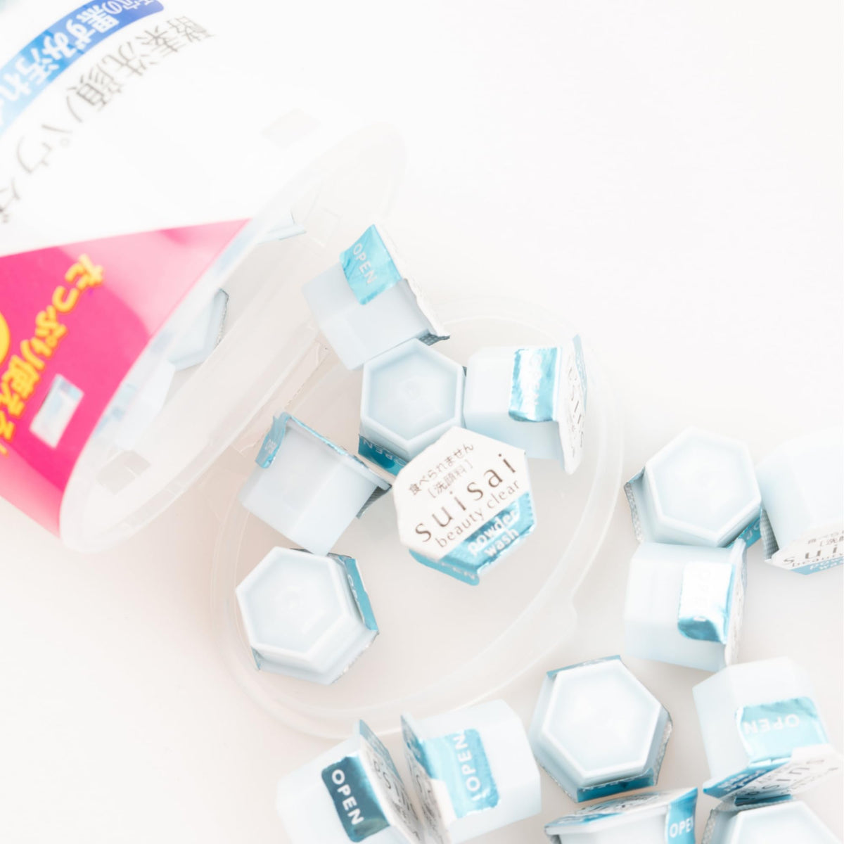 GASHINA STORY Kane-bo capsules beside a coin for size and travel convenience