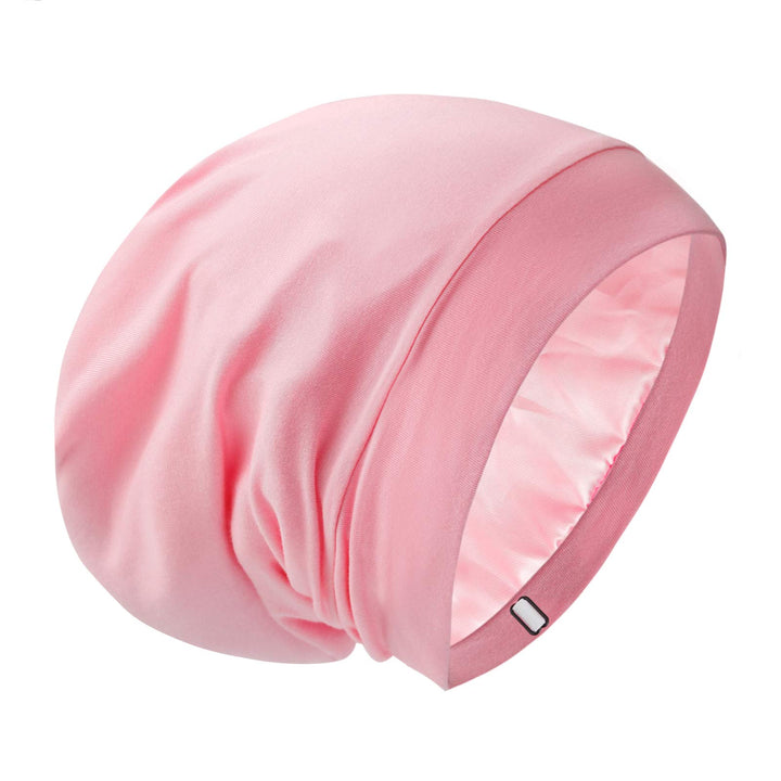 GB Selected front view of solid pink satin-lined sleep bonnet showing full beanie benefit: protection