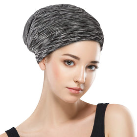 GB Selected bonnet on pillow in bedroom setting illustrating overnight hair preservation