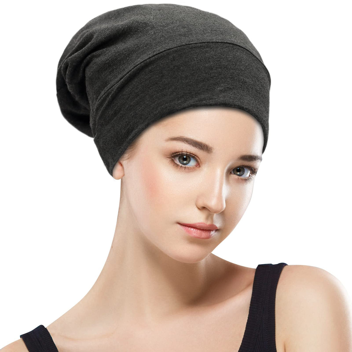 GB Selected bonnet held in hand to show size and generous coverage