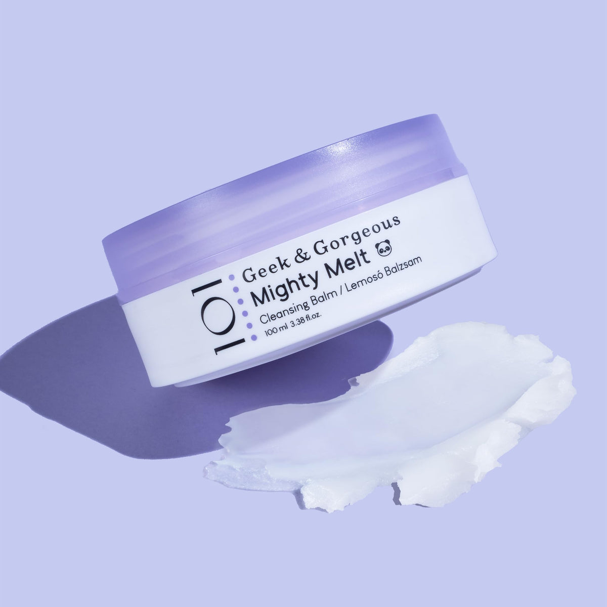 Geek & Gorgeous balm being massaged onto skin, illustrates effective makeup removal benefit