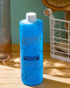 Gelish in-use in a salon wiping nails to reveal clean shiny surface