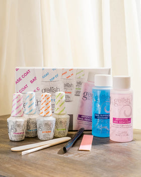 Technician using Gelish Basix Kit products during a manicure for professional finish