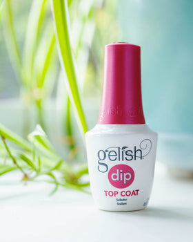 Gelish kit held in hands to show scale and travel-friendly size benefit