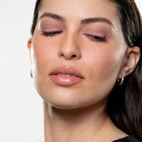 GEN SEE set in a makeup bag lifestyle shot highlighting travel-ready brightening kit