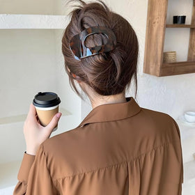 Generic lifestyle in bathroom vanity showing clip use during routines