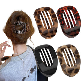 Generic duckbill clips front pack view showing four colors and secure hold