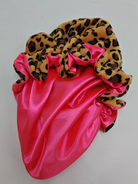 Generic bonnet size comparison beside hand to show roomy crown and volume