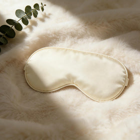 Generic brand woman using blanket and tumbler showing relaxation and recovery