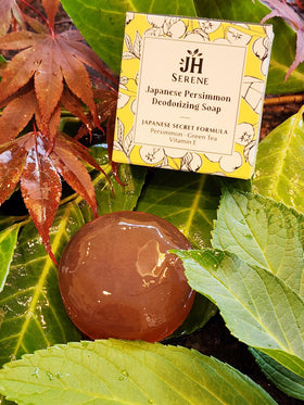 Generic persimmon soap lather in hand demonstrating rich foam and effective deodorizing benefit