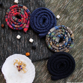 Generic spiral lock worn outdoors in lifestyle setting conveying comfort during active days