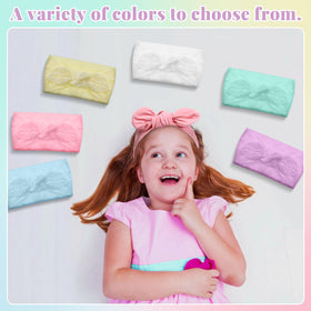 Giegxin headbands on table at birthday party, useful as colorful party favors