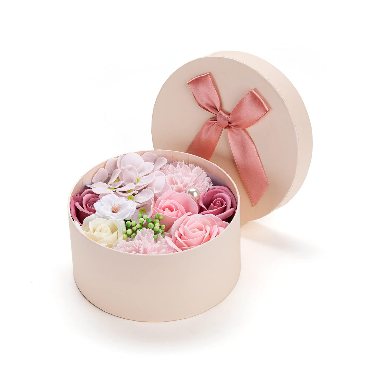 Giga Gud open gift box with assorted rose and carnation soaps arranged neatly