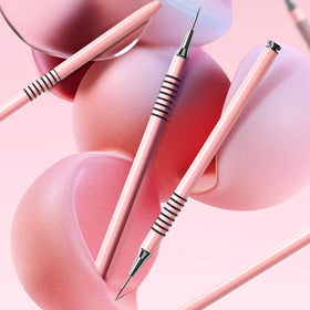 Giifnonnt brushes next to gel polish palette for multi-medium use