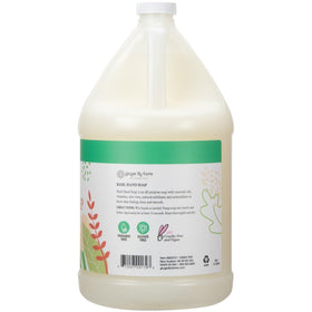 Ginger Lily Farms pouring refill into dispenser for easy, low-waste refills
