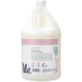 Ginger Lily Farms shampoo being poured to show smooth pour and refill convenience