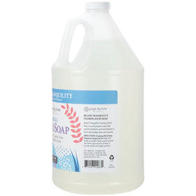 Ginger Lily Farms pouring refill into a foaming dispenser to show easy transfer and savings