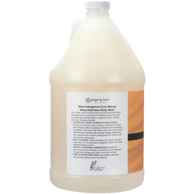 Ginger Lily Farms body wash being poured from gallon showcasing easy refill