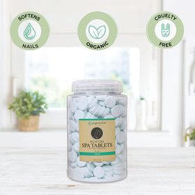 Ginger Lily Farms tablet dissolving in water demonstrating fast effervescence benefits