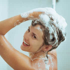 Ginger Lily Farms family shower scene showing gentle, kid-friendly benefit