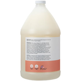 Ginger Lily Farms shampoo texture pouring to show creamy consistency and slip