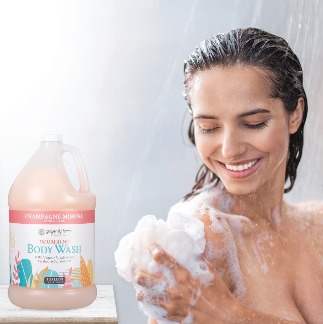 Ginger Lily Farms bottle placed in spa shower setting suggesting clean, refreshing use