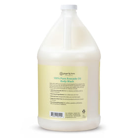 Ginger Lily Farms pouring body wash from gallon bottle to demonstrate easy refill convenience