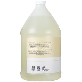 Ginger Lily Farms being poured into a dispenser demonstrating refill convenience