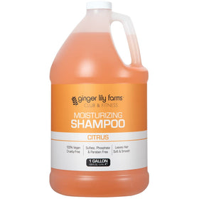 Ginger Lily Farms pouring shampoo from gallon to refill spout for ease