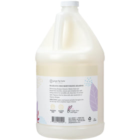 Ginger Lily Farms pouring refill into dispenser for easy economical benefit