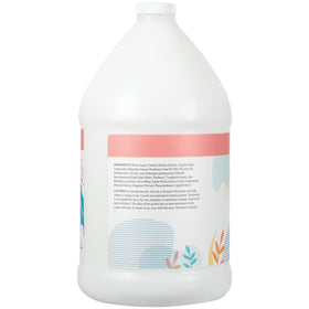 Ginger Lily Farms conditioner pour showing creamy texture and easy application