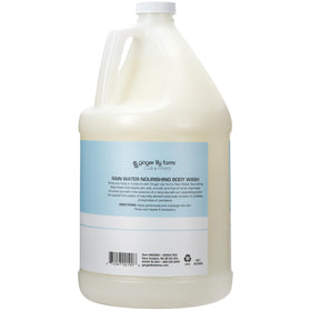 Ginger Lily Farms being poured into shower dispenser for convenient refilling and reduced waste