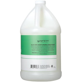Ginger Lily Farms pouring refill into dispenser for economical benefit