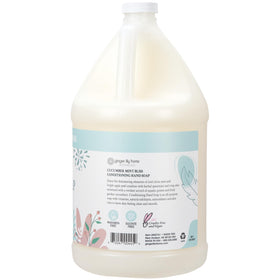 Ginger Lily Farms being poured into a dispenser, refill reduces plastic waste