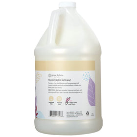 Ginger Lily Farms pouring refill into dispenser for less plastic waste