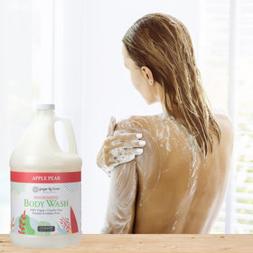Ginger Lily Farms gallon next to smaller bottles showing size and cost-effective refill