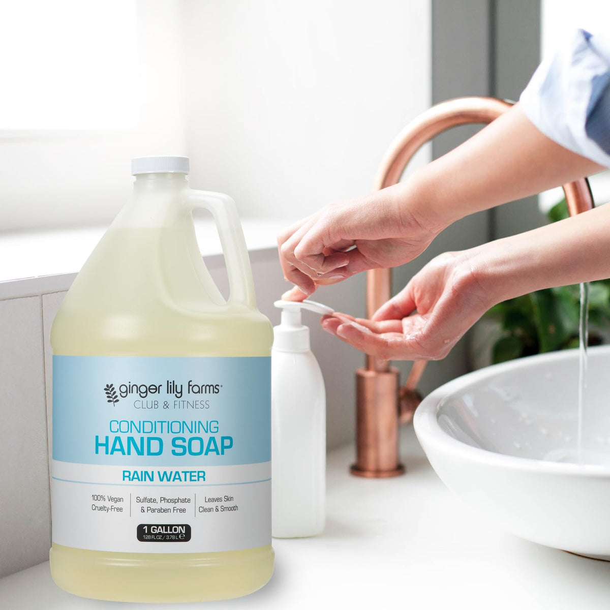 Ginger Lily Farms gallon held beside hands to show scale and long-lasting supply