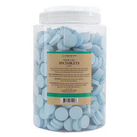 Ginger Lily Farms tablet close-up revealing texture and quick-dissolve design benefits