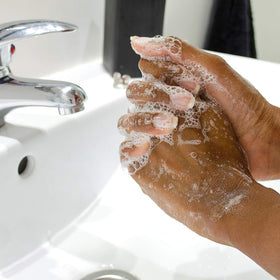 Ginger Lily Farms placed in a bathroom setting promoting calm hygiene
