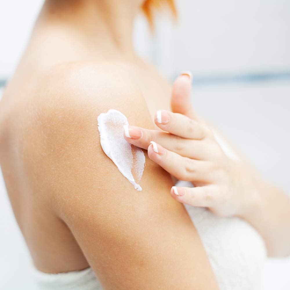 Ginger Lily Farms lotion in a spa scene illustrating gentle daily care