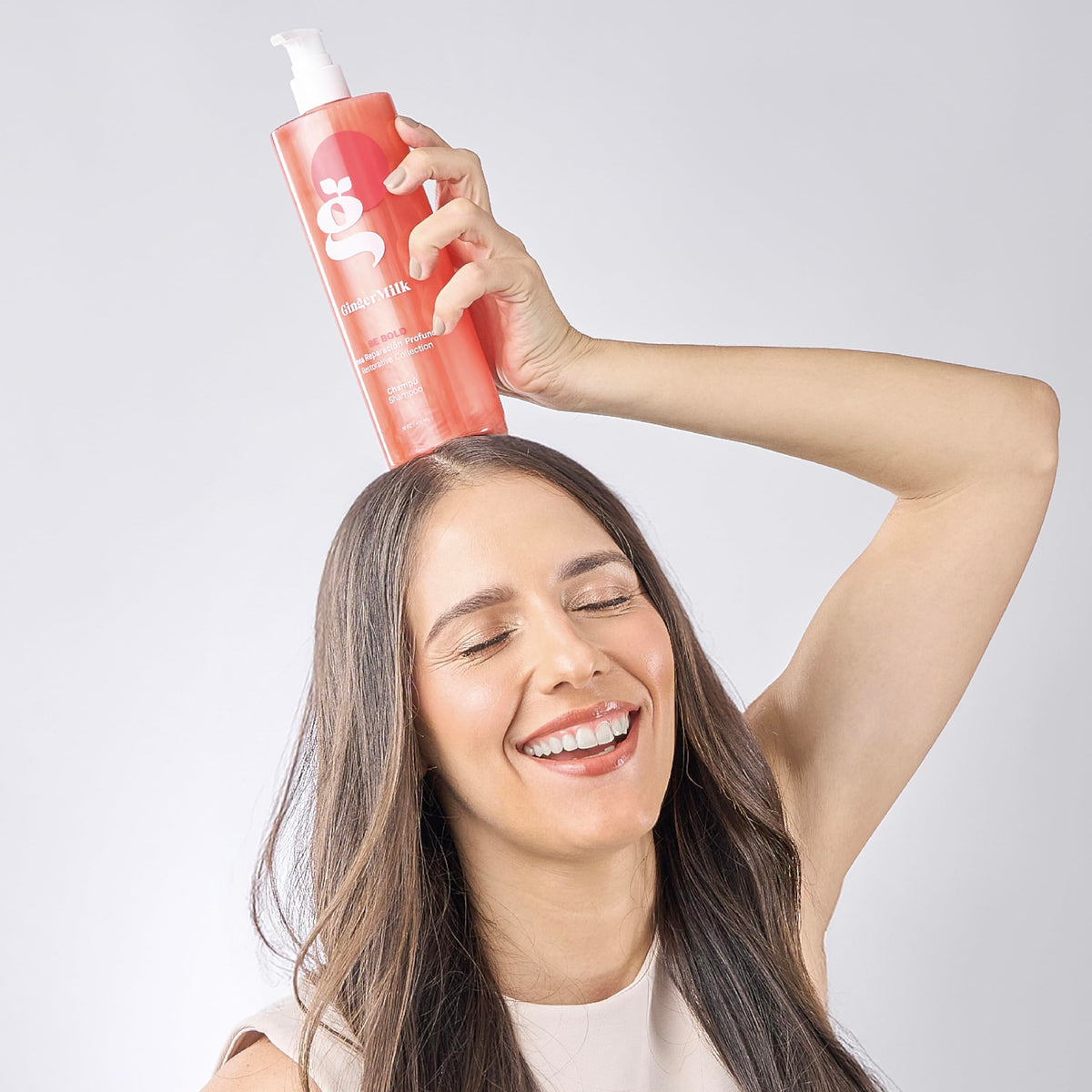 Ginger Milk used on color-treated hair in lifestyle scene for improved manageability