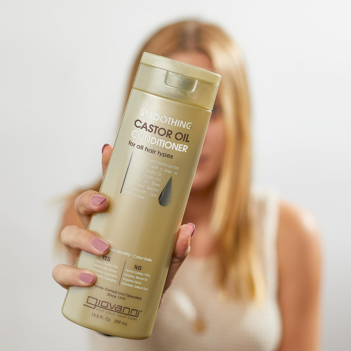 GIOVANNI label and pump detail highlighting ingredient transparency and ease