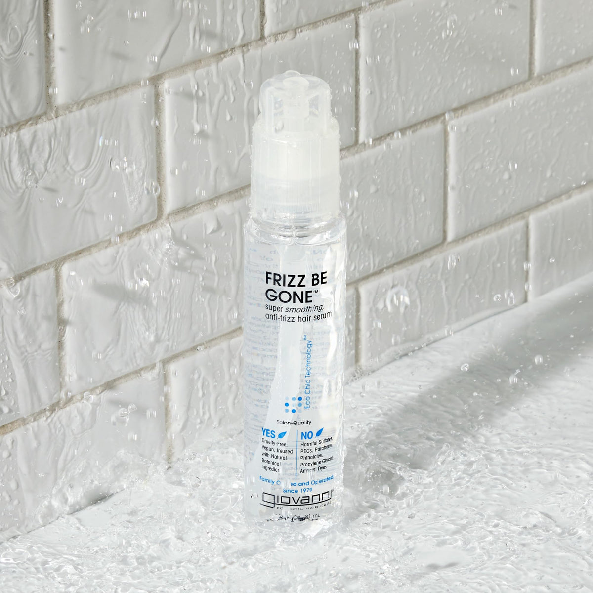 GIOVANNI serum on hands ready to apply for smooth, frizz-free hair