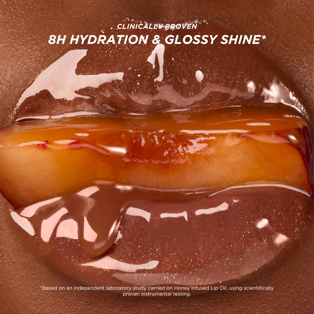 Gisou Glazed Plum lip swipe on arm showing rich tint and reflective shine