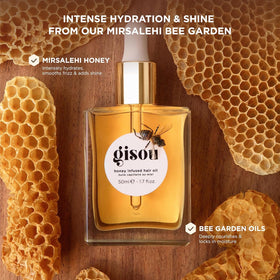 Gisou Honey Infused Hair Oil dropper close-up demonstrating precise application and shine