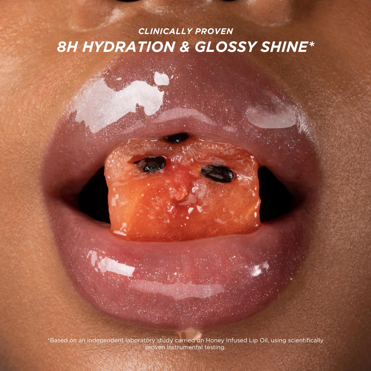 Gisou lip oil cap with honey drip detail highlighting nourishing honey