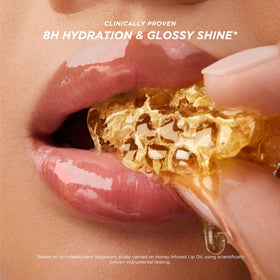 Gisou on lips Honey shade showcasing dewy shine and natural enhancement