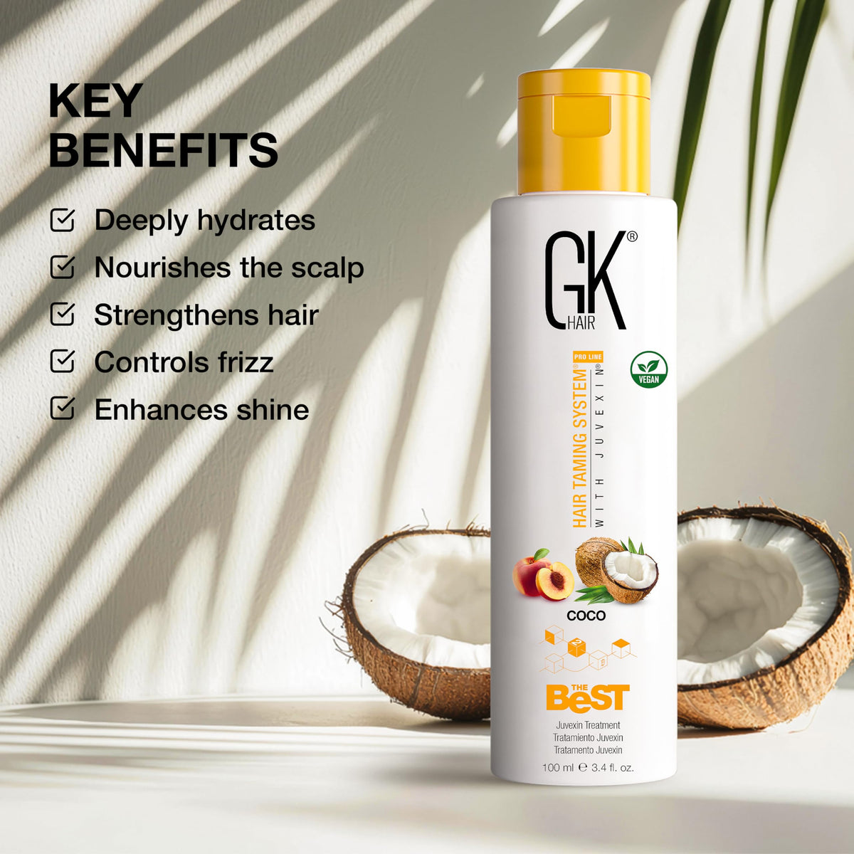 GK HAIR serum texture pouring from bottle showing concentrated smoothing benefit