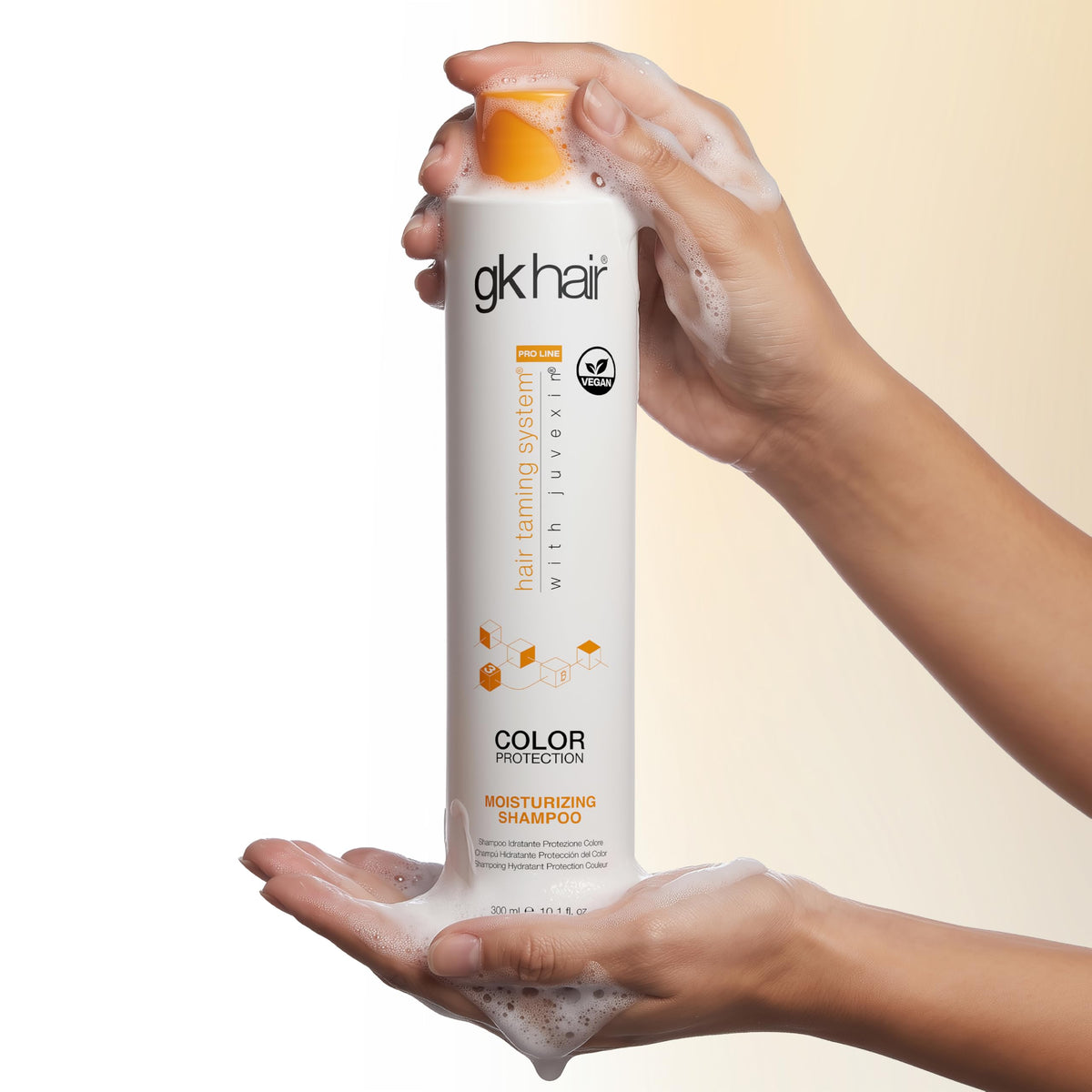 GK HAIR before and after hair photo showing reduced frizz and shine